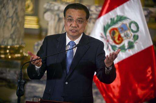 China's Prime Minister Li Keqiang delivers a speech during a ceremony with Peruvian President Ollanta Humala (out of frame) at t