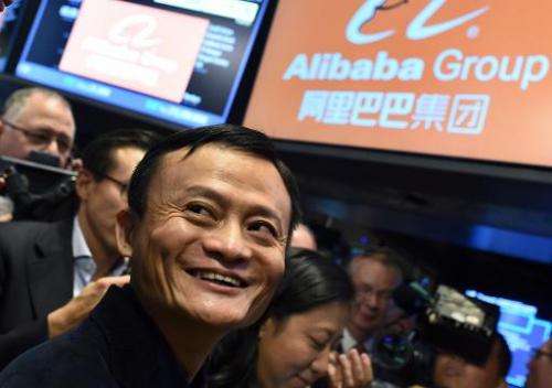Chinese online retail giant Alibaba founder Jack Ma smiles while waiting for the trading to open at the New York Stock Exchange,