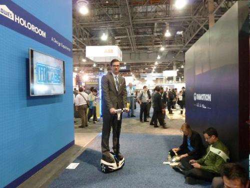 David Fisher of Inmotion SCV demonstrates the company's personal transporter at the Consumer Electronics Show on January 8, 2015