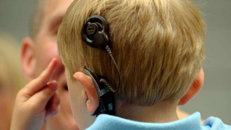 Double cochlear implants improve student grades