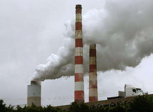 Emissions spew out of a large stack at a coal-fired power plant in Newburg, Maryland on May 29, 2014