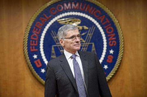 Federal Communication Commission Chairman Tom Wheeler waits for a hearing at the FCC in Washington, DC, on December 11, 2014