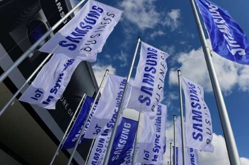 Flags sporting the logo of South Korean electronics giant Samsung flutter ahead of the opening of the 55th IFA (Internationale F