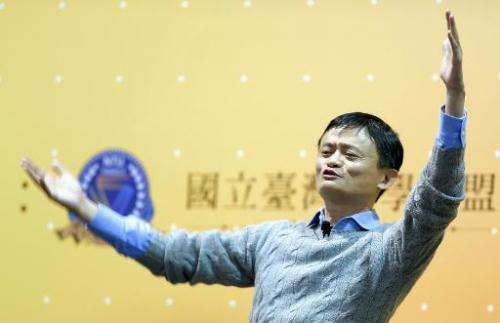 Founder and executive chairman of Alibaba Group, Jack Ma, gestures during a speech at National Taiwan University (NTU) in Taipei
