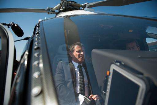 French Prime Minister Manuel Valls sits in an H160 as he visits the Airbus helicopter factory in Marignane, southern France,on M