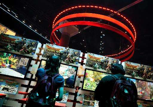 Gamers play Dragon Quest &quot;Heroes&quot; on the second day of the Electronic Entertainment Expo, known as E3 at the Conventio