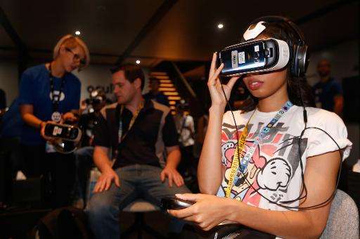 Gamers test the Samsung Gear VR powered by Oculus, at the Annual Gaming Industry Conference E3 in Los Angeles, on June 16, 2015