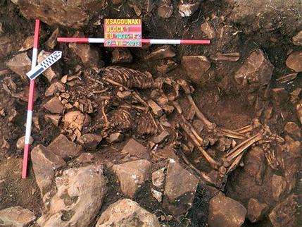 Greek archaeologists find couple locked in millennia-old hug