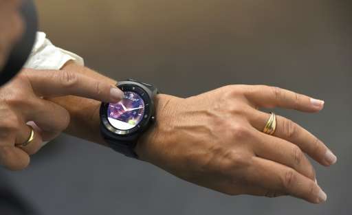 'G watch R', a wristwatch, is presented at the booth of South Korea's electronics giant LG, during the consumer electronics trad