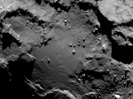 Handout file photo released by the European Space Agency shows a close up detail on comet 67P/Churyumov-Gerasimenko, taken by Ro