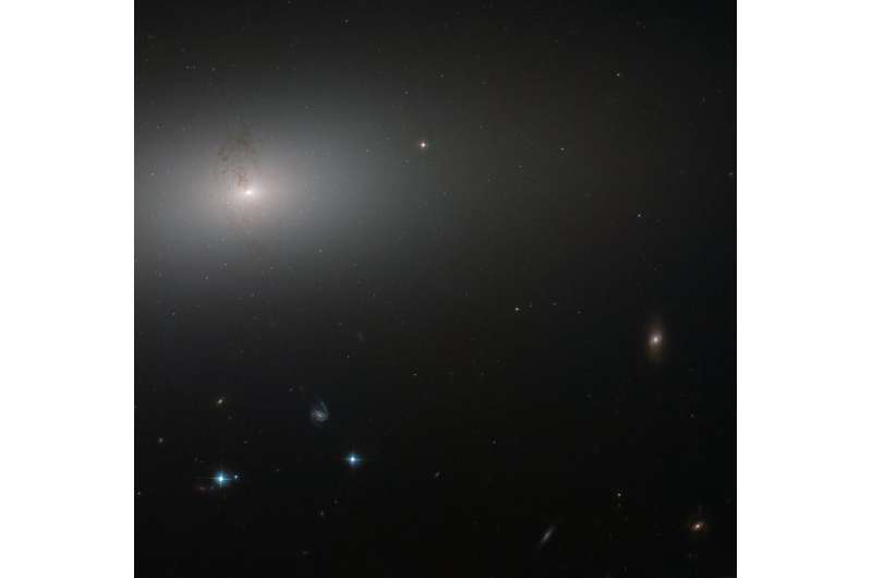 Hubble peers through the elliptical haze