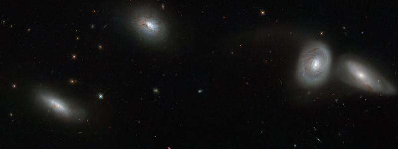 Hubble views a bizarre cosmic quartet