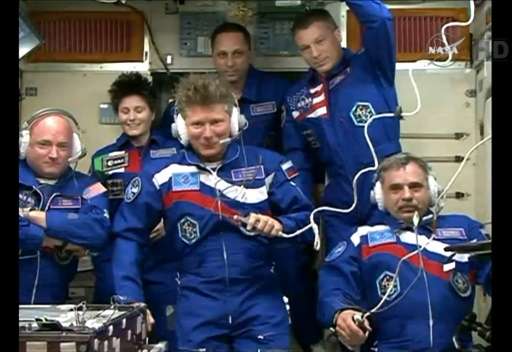 Image from NASA TV shows (front) Scott Kelly, Gennady Padalka  and Mikhail Kornienko and (back) Samantha Cristoforetti, Anton Sh