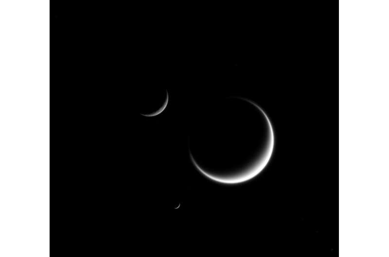 Image: Triple crescent moons in Saturn orbit