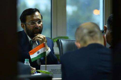 India's Minister of State for Environment, Forest and Climate Change, Prakash Javadekar (L), during a meeting in New Delhi on Fe