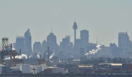 Industrial chimneys belch emmissions across Botany Bay in Sydney