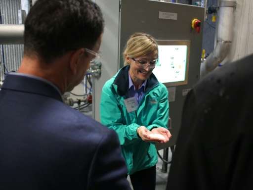 Jane Ritchie explains the carbon capture system at the opening of a Canadian Carbon Engineering pilot plant in Squamish, British