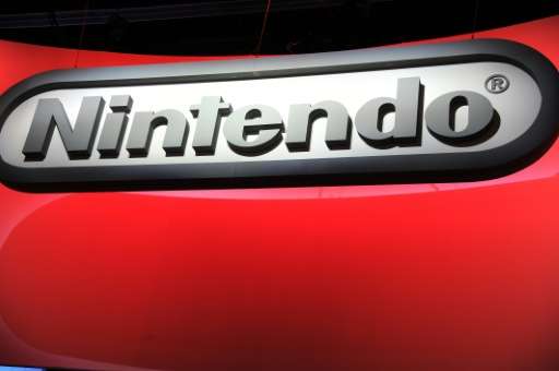 Japanese video game giant Nintendo said Wednesday it swung to a $67 million net profit in the three months to June, owing to a j