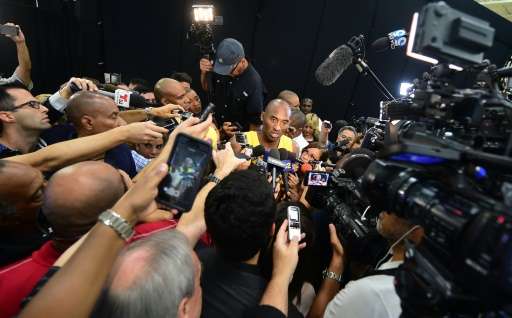 Kobe Bryant of the Los Angeles Lakers avoided a massive media scrum like the one he faced here on September 28, 2015, by announc