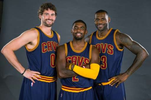 (L-R) Kevin Love, Kyrie Irving and LeBron James of the Cleveland Cavaliers pose during the Cleveland Cavaliers media day at Clev
