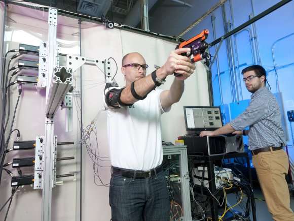 Mechatronic arm exoskeleton to train new soldiers to reach shooting proficiency
