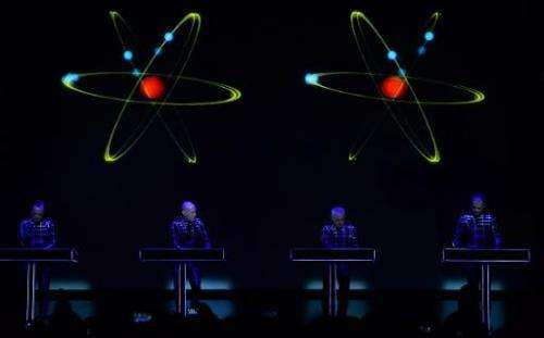 Members of the German band Kraftwerk perform their piece &quot;Radioactivity&quot; during a concert at the Neue Nationalgalerie 