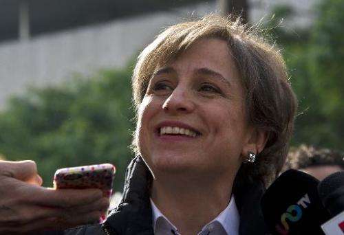 Mexican journalist Carmen Aristegui speaks to the press in Mexico City on March 16, 2015, a day after being fired