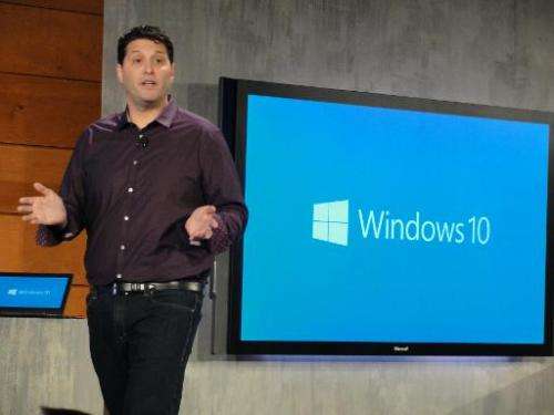 Microsoft executive Terry Myerson describes features being built into coming Windows 10 software at a press event in Redmond, Wa