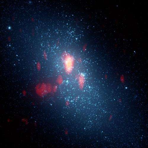 More than a million stars are forming in a mysterious dusty gas cloud in a nearby galaxy