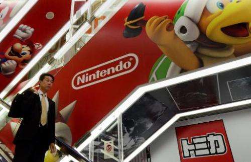 Nintendo shares have zoomed up more than 21 percent after the videogame giant said it will enter the booming market for games on