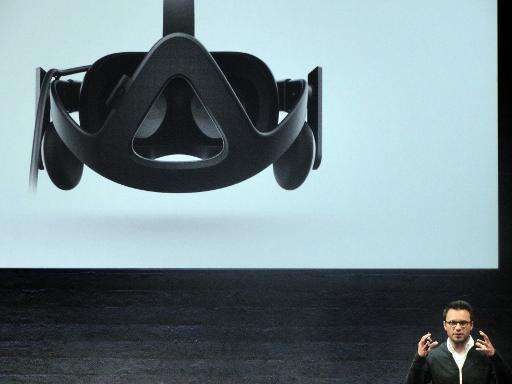 Oculus chief executive Brendan Iribe unveils Rift virtual reality head gear on June 11, 2015 in San Francisco, California