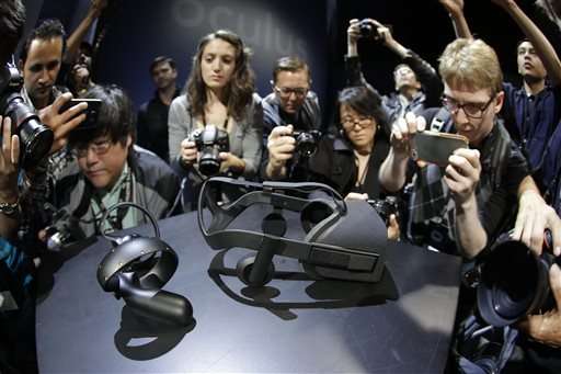 Oculus' virtual-reality headset to simulate touch, gestures