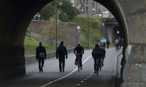 People on the Baana pedestrian and bicycle lane in Helsinki, Finland on October 8, 2014