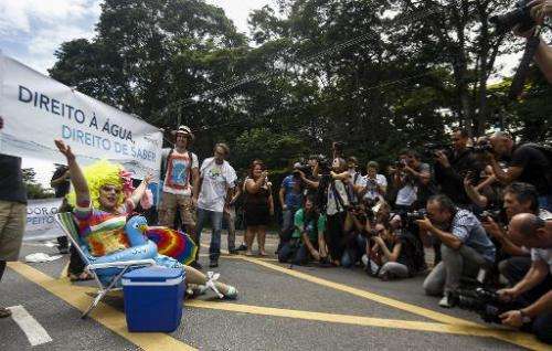 People protest against the lack of water in Sao Paulo, Brazil in front of the governmental palace on January 26, 2015
