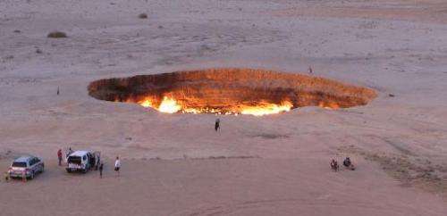People visit &quot;The Gateway to Hell,&quot; a huge burning gas crater in the heart of Turkmenistan's Kara Kum desert