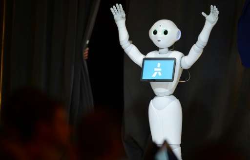 'Pepper' the humanoid robot communicates with the audience during a demonstration at WSJDLive technology conference in Laguna Be
