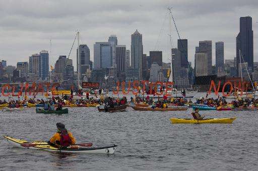 Protesters shouted &quot;Shell, no!&quot;, banged their oars on the sides of their boats and paddled around to play cat-and-mous