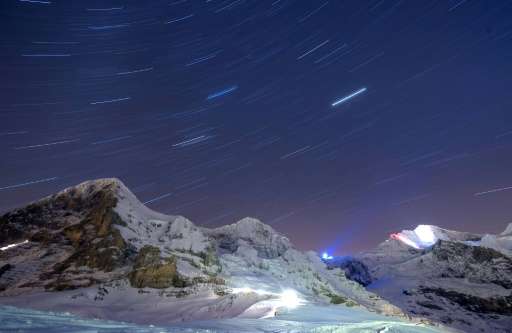 Record warm temperatures have been recorded at Switzerland's famous Jungfrau mountain (at right, seen in a long-exposure picture