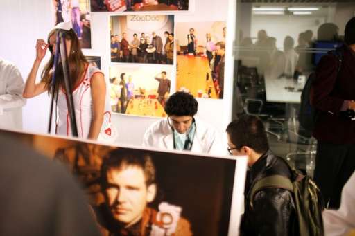 Recruiters from ZocDoc speak with job seekers at the New York City Startup Job Fair on April 8, 2011