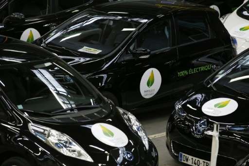 Renault's Leaf and Zoe electric vehicles, pictured November 16 2015 bearing stickers for the COP21 climate summit in Paris, are 