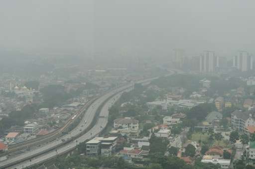 Residential houses and commercial buildings covered in haze in Kuala Lumpur on September 29, 2015