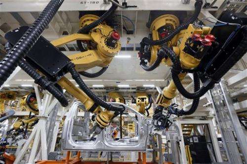 Robots replacing human factory workers at faster pace