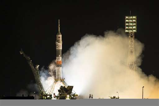 Russian capsule docks with International Space Station