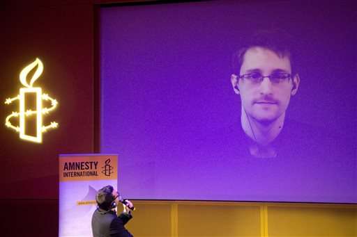 Snowden on video at NYC forum to promote privacy treaty