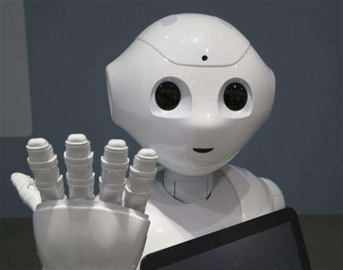 Softbank to add learning technology to empathetic robot