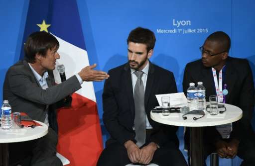 Special envoy of the French President for the protection of the planet Nicolas Hulot (L) talks with representatives during the &