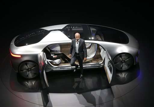 Tech disruption hangs over automakers at Frankfurt show