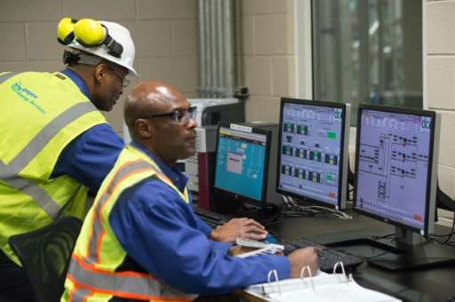 Technicians monitor operations at DC Water's Blue Plains plant