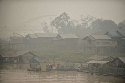 The Kahayan riverbank in Palangkaraya, a city of 240,000 that has been engulfed in poisonous darkness by smoke from peat land se