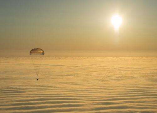 The Soyuz TMA-14M spacecraft is seen as it lands with Expedition 42 commander Barry Wilmore of NASA, Alexander Samokutyaev of th